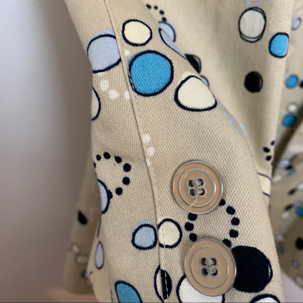 I.e. Tan trench coat with Mod circle design. - Picture 4 of 8